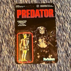 ReAction Figurine Unmasked Predator 3 3/4 inch fully posable action figure.